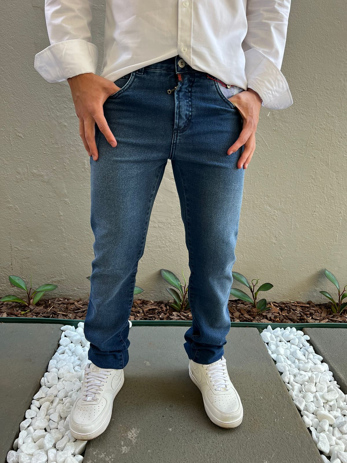 Calça jeans com elastico na new arrivals barra masculina