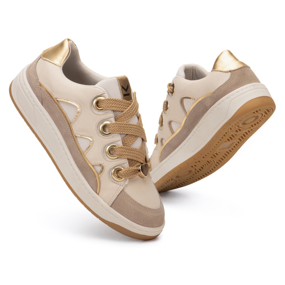 Tenis de couro dourado feminino online