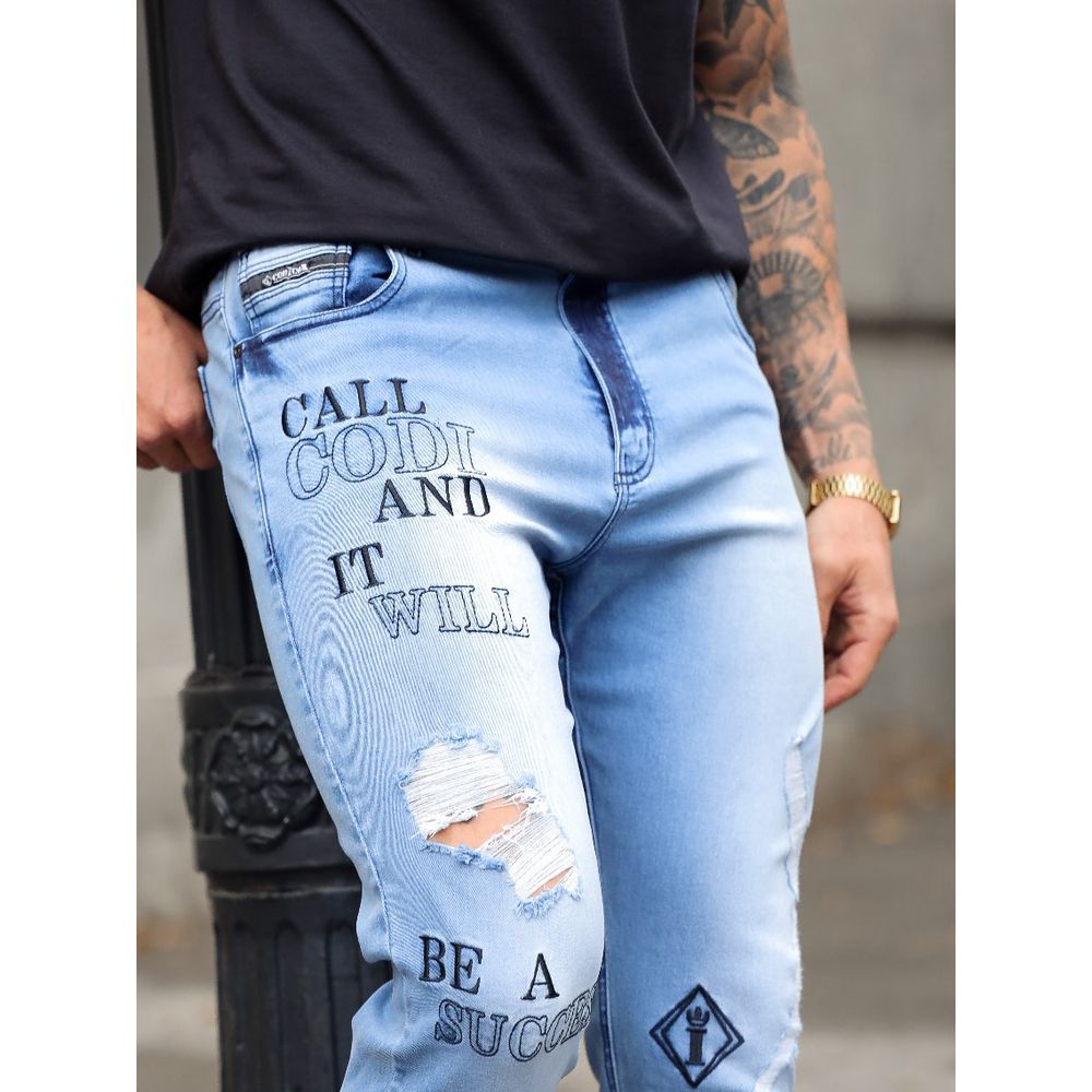 Calça Jeans Skinny Destroyed Rasgada Bordado Detalhe Premium Azul