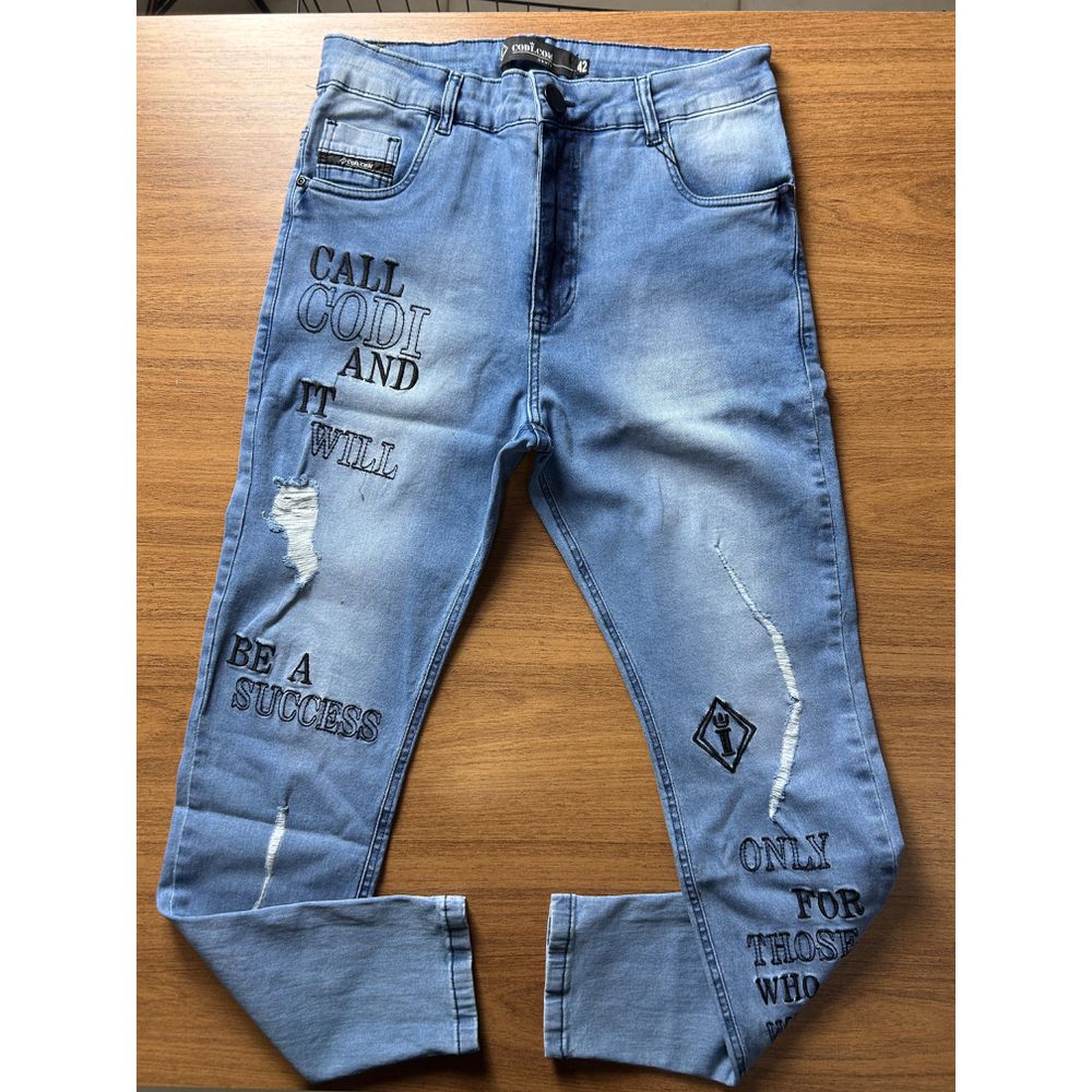 Calça Jeans Skinny Destroyed Rasgada Bordado Detalhe Premium Azul