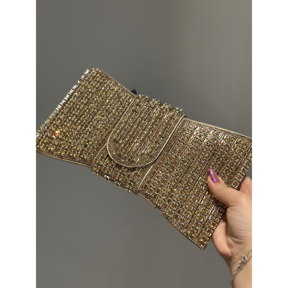 CLUTCH LAÇO PEDRARIA DOURADO
