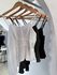 BLUSA PEPLUM ASSIMÉTRICA OFF