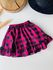 short saia xadrez 