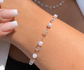 Pulseira de perolas e cristais 