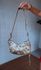 Bolsa Detalhes Metalizados Dourado