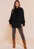 PONCHO PLUMA