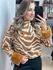 Blusa Malha Animal Print