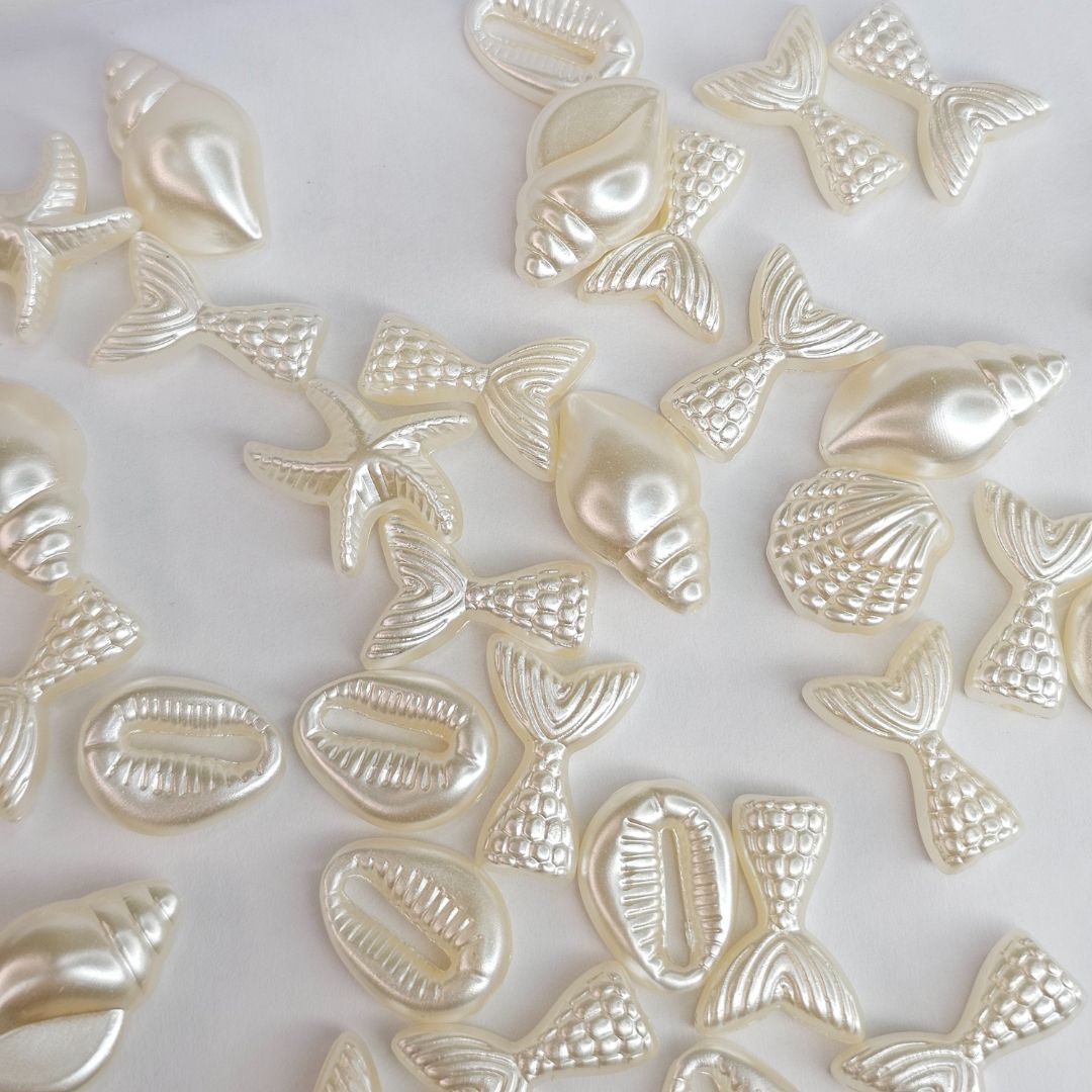 PINGENTE ENTREMEIO CONCHAS E MAR PEROLADA - 30g - METALVALE BIJU