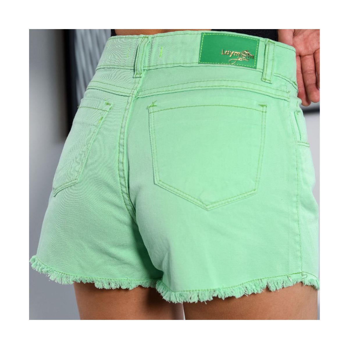 Short jeans verde shop feminino