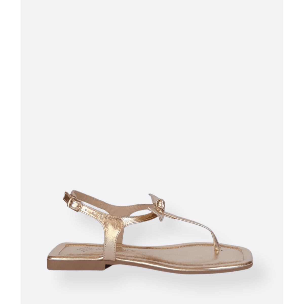 Rasteira Com Laço Dourada Stellare