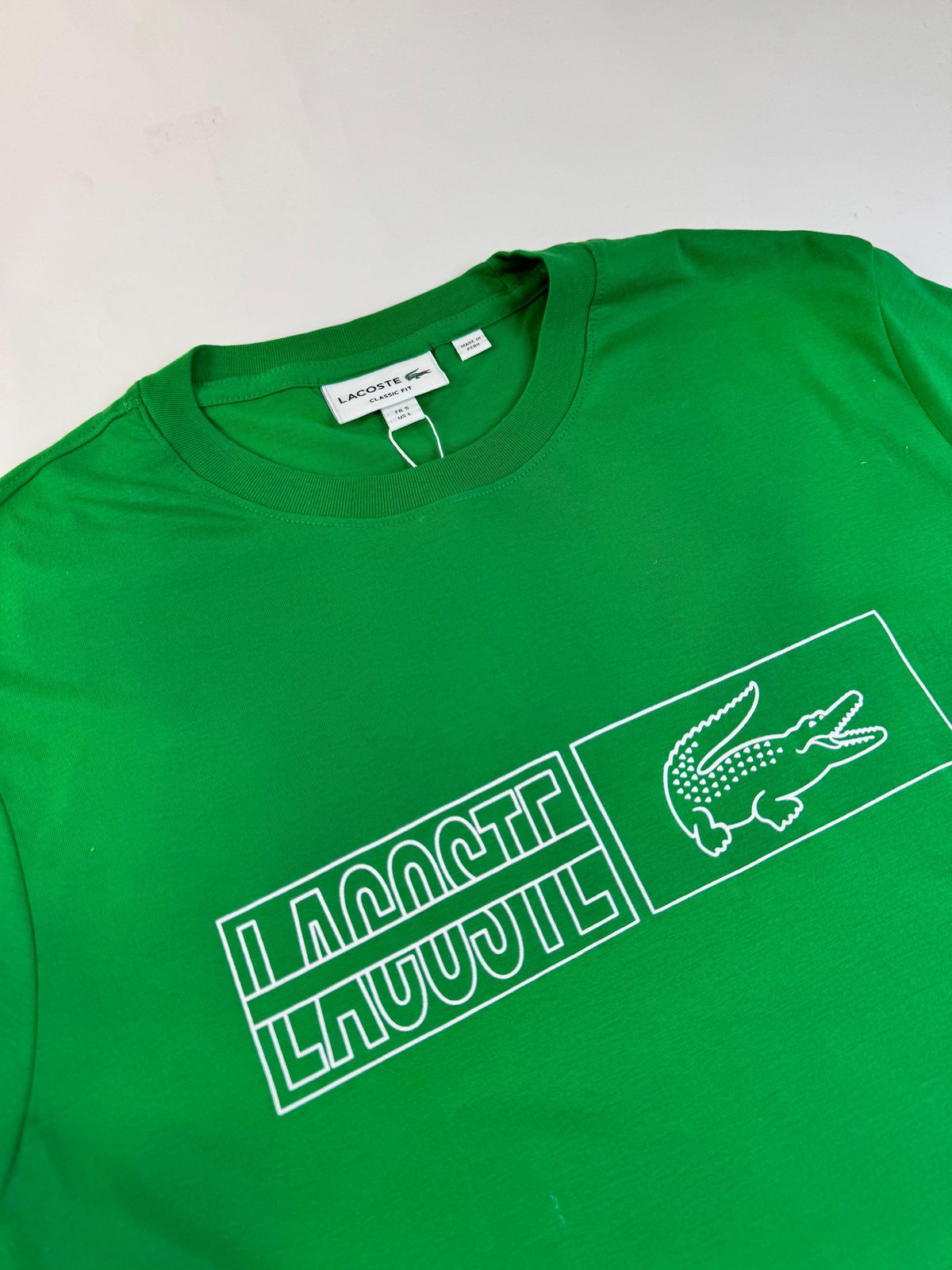 Camiseta Lacoste com Bag - SP GRIFES - Camisetas Importadas no Atacado