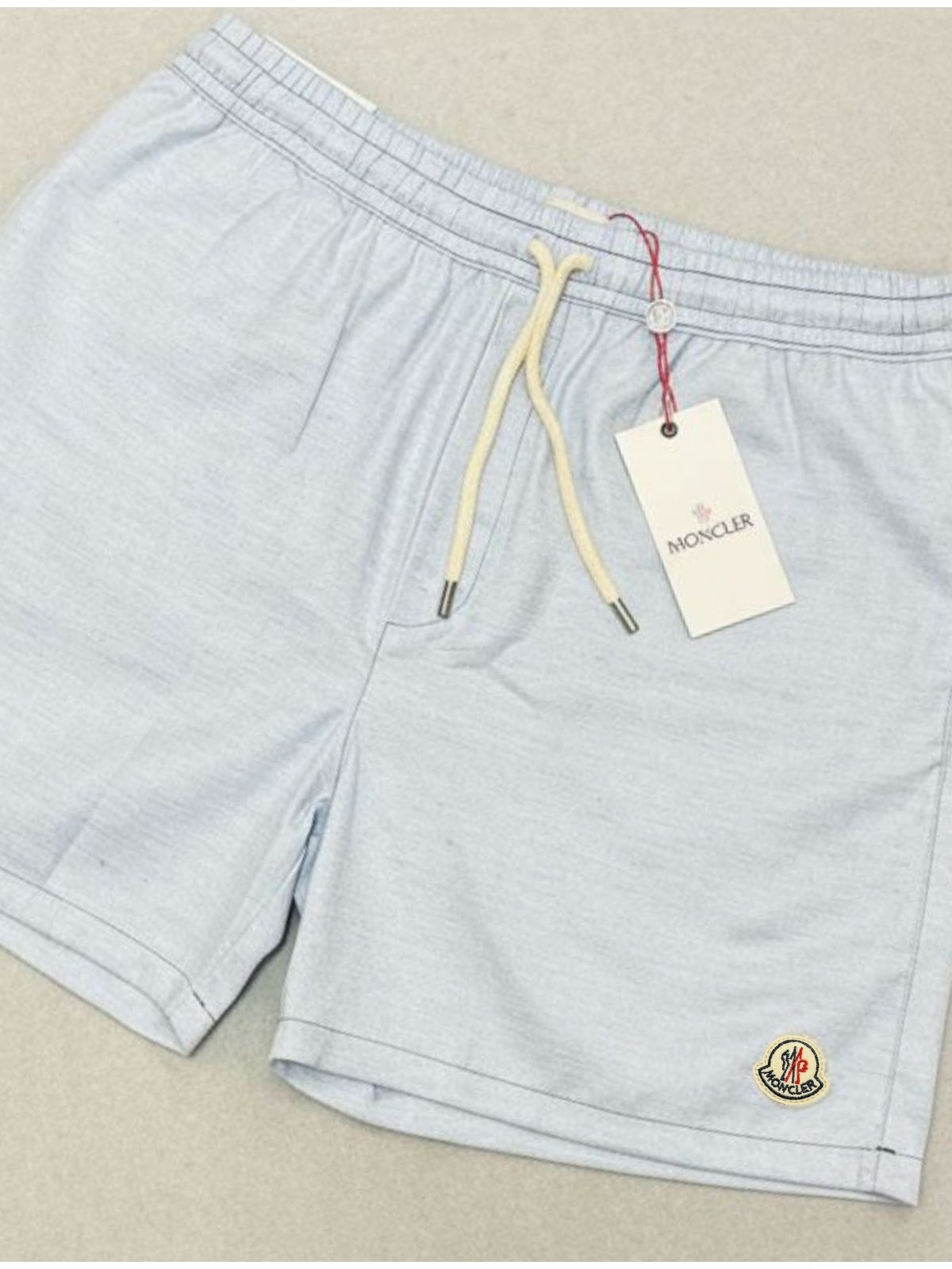 Short Moncler - Azul bebê - SP GRIFES - Camisetas Importadas no Atacado