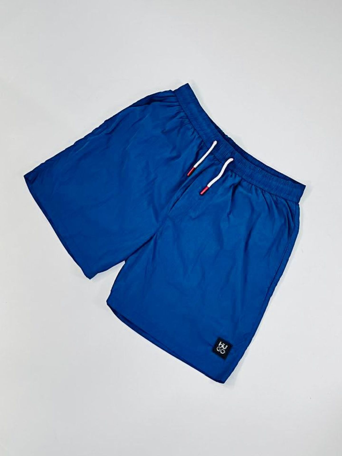 SHORT HUGO BOSS - AZUL CIANO - SP GRIFES - Camisetas Importadas no Atacado