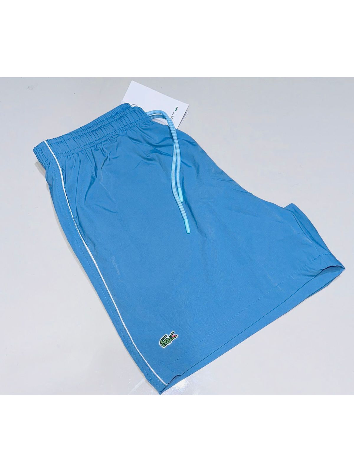 SHORT LACOSTE - SP GRIFES - Camisetas Importadas no Atacado