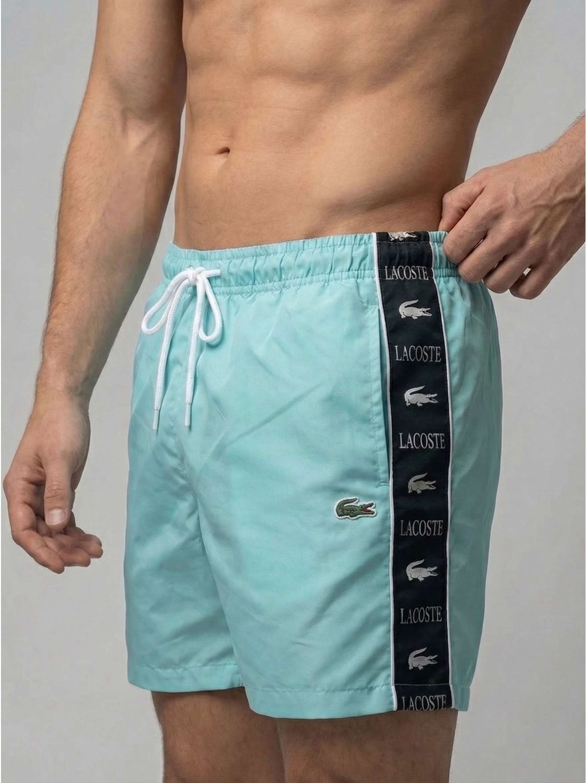 SHORT LACOSTE - AZUL CLARO - SP GRIFES - Camisetas Importadas no Atacado