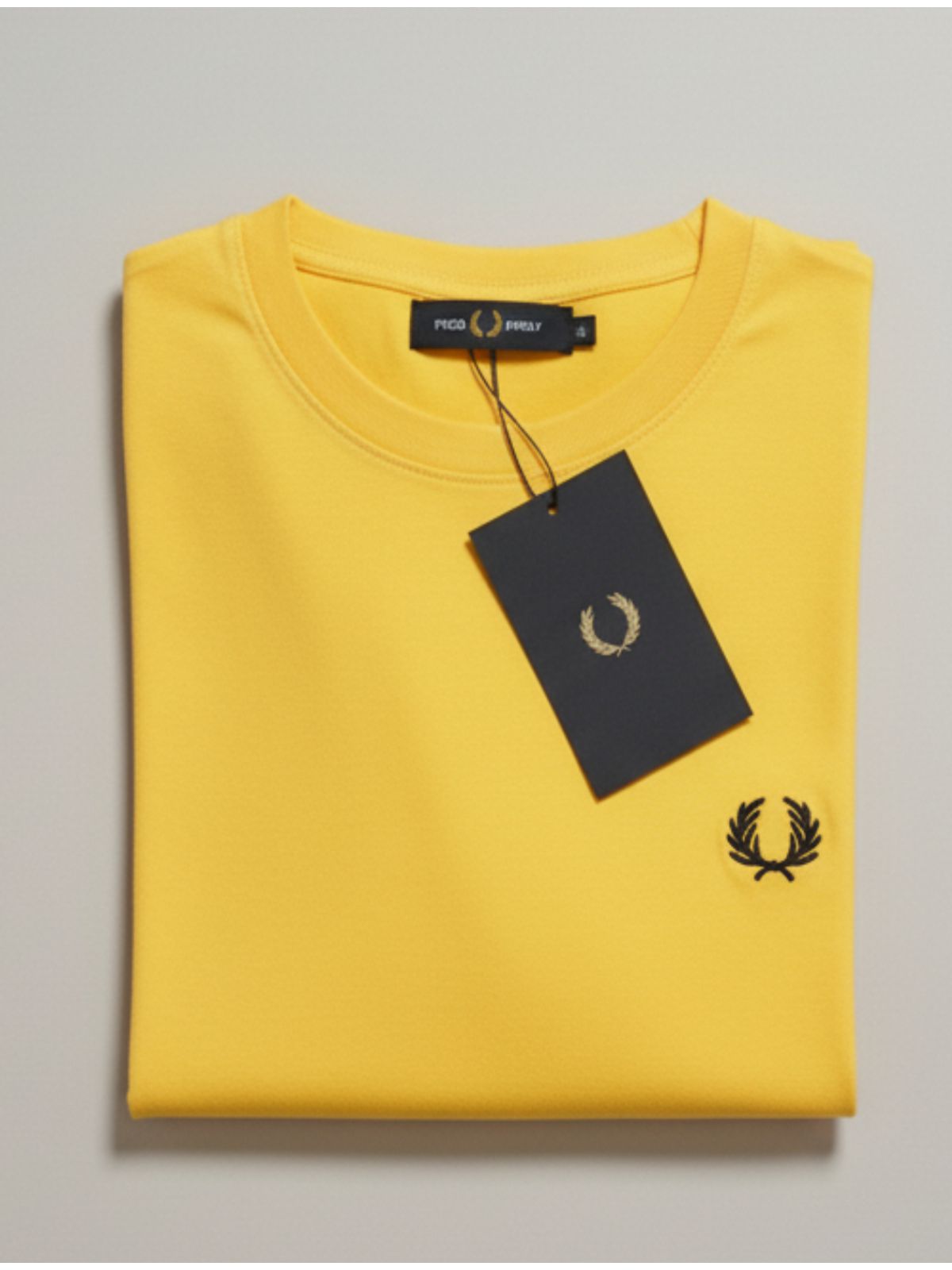 Camiseta Fred Perry - Amarelo com logo Preta - Egí... - SP GRIFES - Camisetas Importadas no Atacado
