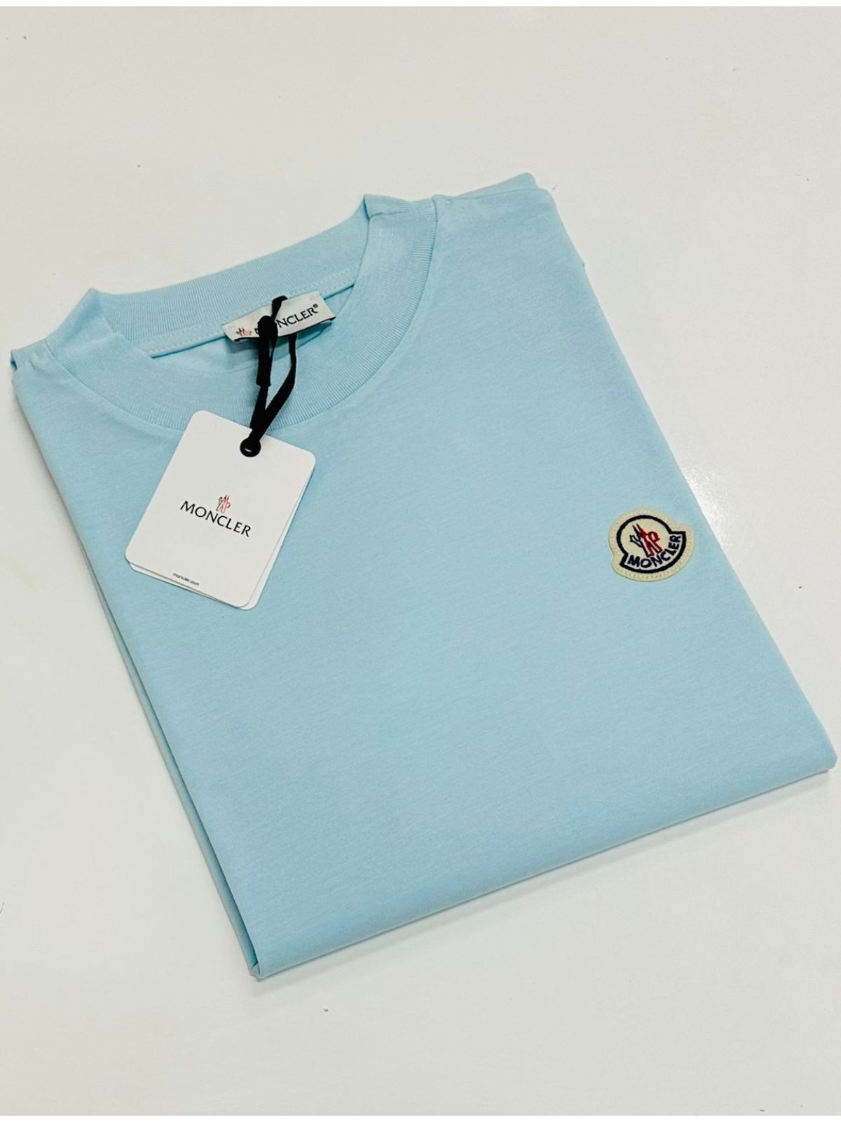 CAMISETA MONCLER - AZUL CLARO - SP GRIFES - Camisetas Importadas no Atacado