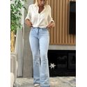 Calça Jeans Flare Com Cintura Alta E Barra Desfeita
