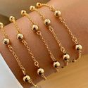Pulseira de esferas pequenas lisas