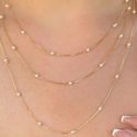 Colar alongado com perolas (cada)