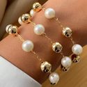 Pulseira de perola e esferas (cada)