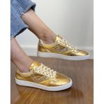 TÊNIS CACÁ EM COURO DOURADO COM DETALHE BROCADO