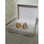 BRINCO FLOR ENTRELAÇADA BANHADO A OURO