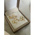 BRINCO ARGOLA PONTO DE LUZ REDONDO PENDENTE BANHADA A OURO