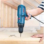 PARAFUSADEIRA ELETRICA /FURADEIRA 400W.(GSR7-14E) COM BOLSA 110V/220V - BOSCH 