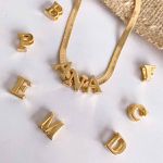 Pingente Letra Galeria Banhada a Ouro