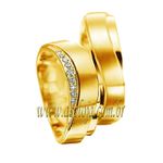 Aliança de noivado ou casamento curva em ouro amarelo 18K cravada com 9 diamantes largura de 6,50mm