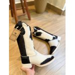 BOTA TEXANA EM COURO PELOS VACA MALHADA PRETO E BRANCO SOLADO BRANCO