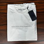 Camiseta CK Off White DFC. 