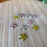 Aplique estrela com glitter 2cm sortido 10un