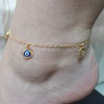 Tornozeleira Folheada Dourado Olho Grego e Estrelas 