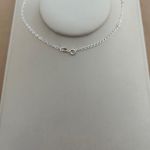 CHOKER COM 7 CORAÇÕES PEQUENOS VAZADOS PENDURADOS ELOS ALONGADOS