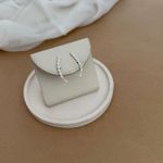 EAR CUFF TRANÇADO COM 7 ZIRC NAVETE CRISTAL DE TARRAXA