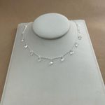 CHOKER COM 13 ZIRCÔNIAS CRISTAL SEM BORDA PENDURADAS CARTIER 