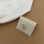 ANEL APARADOR MEIA ALIANÇA COM ZIRCÔNIAS VERDE