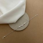 PULSEIRA 3 TREVOS ZIRCÔNIA CRISTAL COM BORDAS ELOS OVAIS
