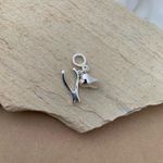 BERLOQUE DENTISTA COM ALICATE E DENTE 