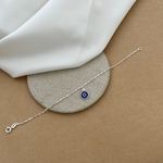 PULSEIRA CARTIER FININHA COM OLHO GREGO PENDURADO
