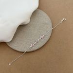 PULSEIRA INFANTIL ELO PORTUGUÊS COM 3 ZIRCÔINIAS REDONDAS ROSA 