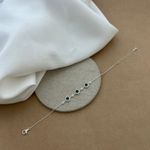 PULSEIRA COM ZIRCÔNIA REDONDA ESMERALDA LATERAL CRAVEJADA
