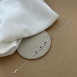 PULSEIRA COM 3 ZIRCÔNIAS OVAIS ROSA LATERAL CRAVEJADA