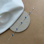 PULSEIRA COM 5 ZIRCÔNIAS REDONDAS AZUIS ESCURO CARTIER