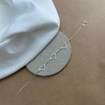 PULSEIRA 3 CORAÇÕES VAZADO 2 ZIRCÔNIAS CRISTAL