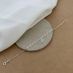 PULSEIRA ELOS OVAIS COM GOTA ZIRCONIA CRISTAL PENDURADA