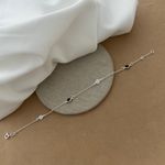 PULSEIRA COM ZIRCÔNIA REDONDA BRANCA E PRETO COM BORDA