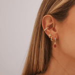 Brinco Astros- banho ouro 18k